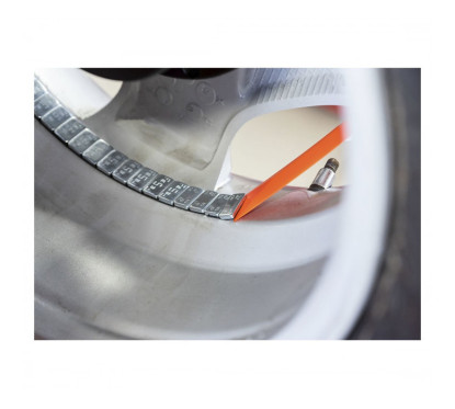 Spatule plastique pour décoller les masses autocollantes